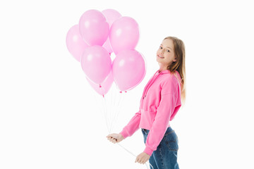 Wall Mural - happy teenage girl with pink balloons looking at camera isolated on white
