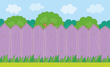 Wood Fence On The Backyard. Grass Lawn And Purple Wooden Fence