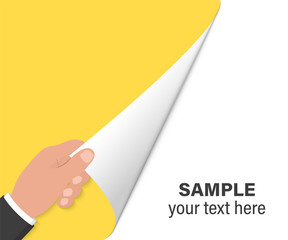 Poster - hand turns page on white background. hand turning empty page. close up of hand turning the blank pag