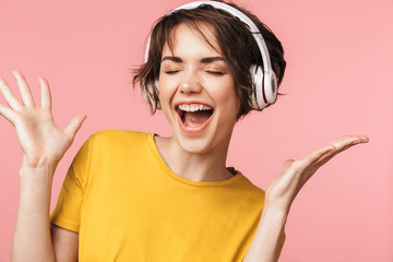 Wall Mural - Close up of an attractive young woman standing