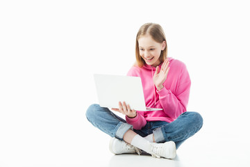 Wall Mural - happy smiling teenage girl waving hand in laptop screen during video chat isolated on white, illustr
