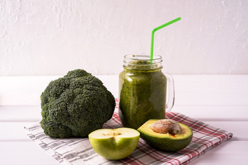 Wall Mural - Green Smoothie With Spinach, apple, celery, kiwi, Brussels sprout, avocado.