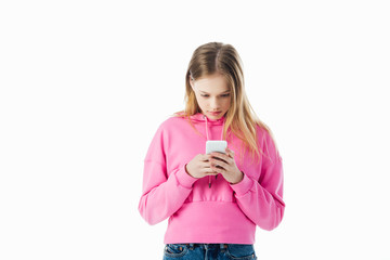 Wall Mural - teenage girl in pink hoodie using smartphone isolated on white with copy space