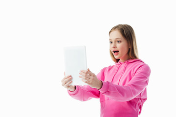 Wall Mural - excited teenage girl having video chat on digital tablet isolated on white