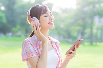 Wall Mural - girl listen music with earphones