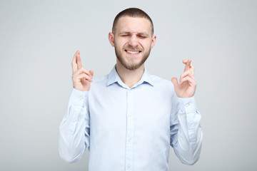 Poster - Portrait of young man on grey background