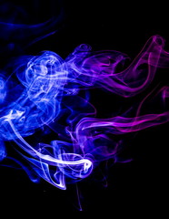 Colored smoke on black background