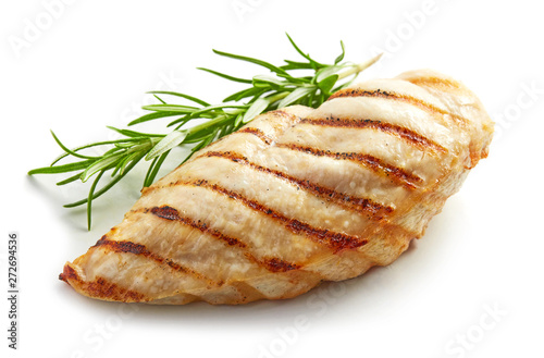 Fotomural Grilled chicken breast with rosemary isolated on white background