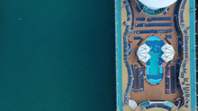 Aerial Top View Of Cruise Ship Docked In Mediterranean Destination