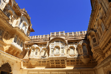 Fototapete - inside Mehrangarh fort view at the decorative building facade in Jodhpur, Rajasthan, India