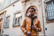 © Westend61 - Italy, Florence, portrait of bearded man wearing sunglasses and light brown leather jacket