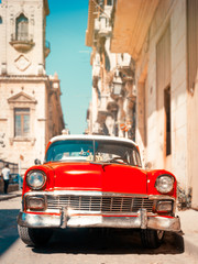 Sticker - Classic red car on a narrow street in Old Havana