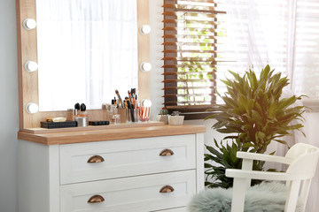 Canvas Print - Dressing table with luxury cosmetics and accessories in room near window