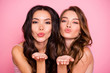© deagreez - Close up photo of cute charming ladies fellows fellowship send air kiss attract men want date valentine day wavy curly haircut long modern trendy stylish clothing isolated pink background