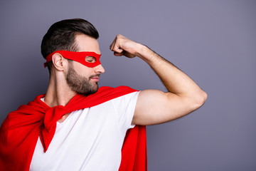 Poster - Close-up portrait of his he nice-looking attractive content bearded guy businessman demonstrating looking at powerful muscles isolated over gray pastel violet purple background