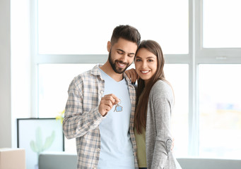 Sticker - Young couple with keys in their new house