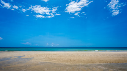 Canvas Print - Sand beach and blue sky background