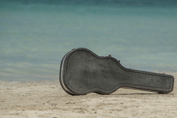 Wall Mural - GUITAR CASE ON A BEACH