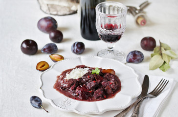 Poster - Beef Bourguignon  with plums. beef with red wine and plums,  stewed second course. dish with meat. 