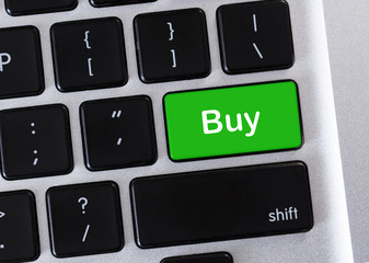 Poster - Word Buy on green button of computer keyboard