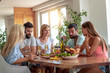 © ivanko80 - Friends have lunch at home