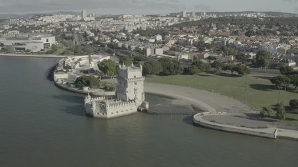 Wall Mural - Belem tower in Lisbon, Portugal, UNESCO site, 4k aerial ungraded raw
