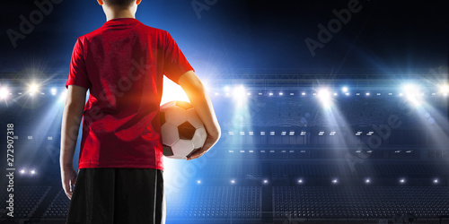 Little soccer champion. Mixed media