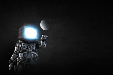 Wall Mural - astronaut with tv head on black background. mixed media.