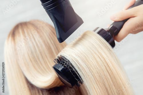 close-up-of-hair-dryer-concept-cut-salon-female-stylist