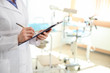 © Pixel-Shot - Beautiful gynecologist in her office