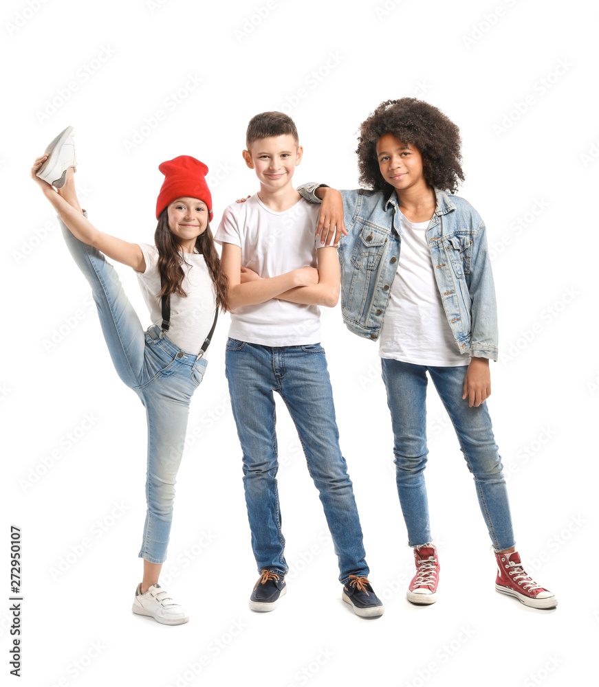 Stylish children in jeans on white background
