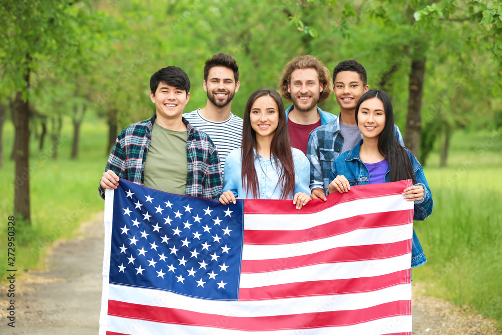 Group of students with USA flag outdoors
