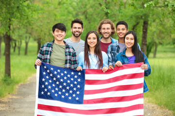 Wall Mural - Group of students with USA flag outdoors