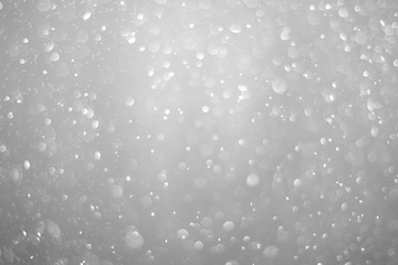 Wall Mural - Bokeh background and bubbles reflecting black and white light