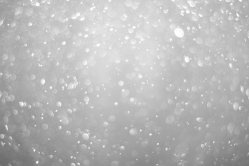 Wall Mural - Bokeh background and bubbles reflecting black and white light