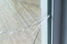 Crack On The Glass At A Residential House