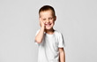 © FAB.1 - Surprised boy looking at the camera. Beautiful happy child, isolated on white background