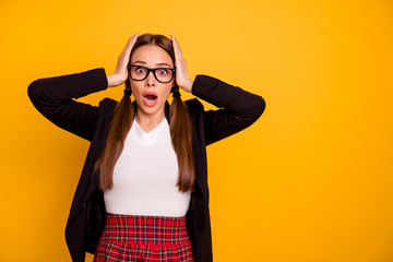 Wall Mural - Portrait lovely astonished lady teen teenager impressed terrified touch head scream shout omg white red skirt tails beautiful pullover sweater black jacket isolated yellow background