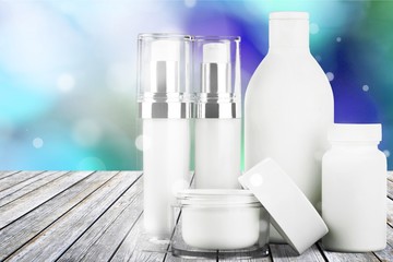 Poster - Cosmetic containers isolated on background