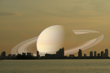 Wall Mural - Saturn on night sky back silhouette city on sunset