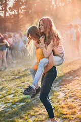 Portrait of happy young girls on holi color festival