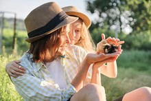Happy Family Mother With Daughter In Nature, Woman Holding Small Newborn Baby Chicks In Hands, Farm, Country Rustic Style
