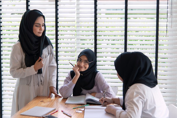 Muslim education activities in classroom at school, happy children learning.