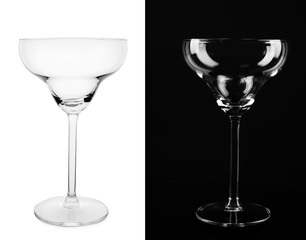 Empty glasses on white and black background