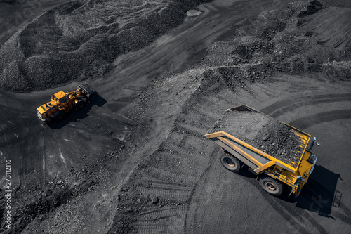 Fotografía Open pit mine industry, big yellow mining truck for coal, top view aerial
