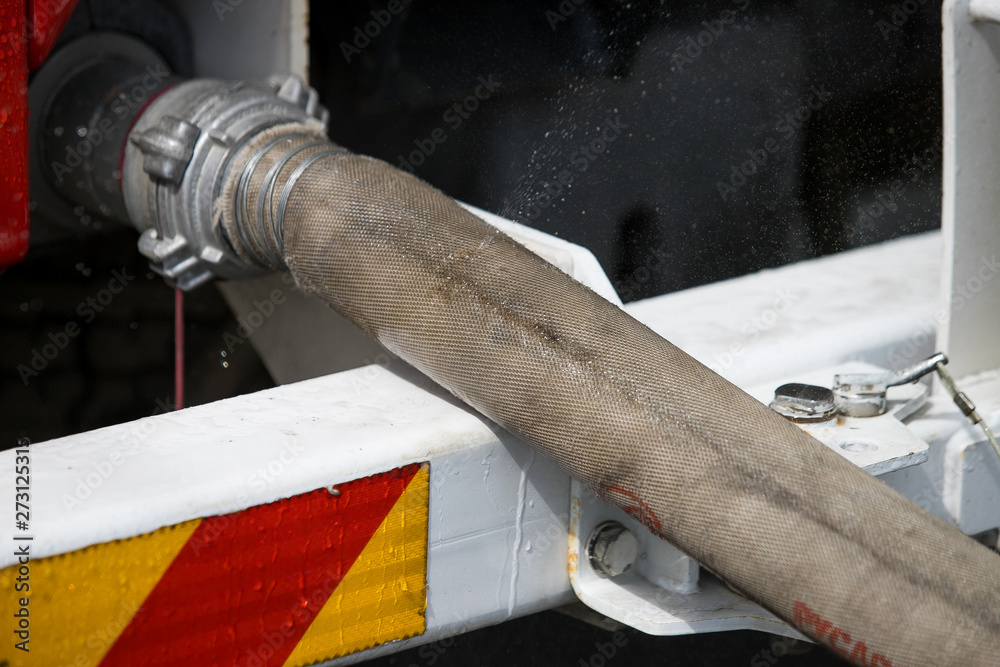 Fire extinguishing equipment. Fire hose with a water distribution ...