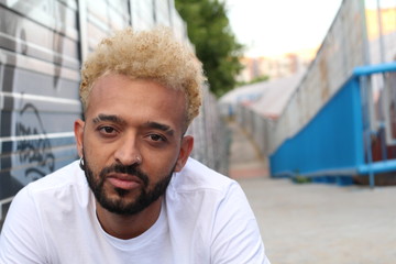 Wall Mural - African American man with swag looking at camera 