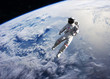 © Photocreo Bednarek - Astronaut conducting spacewalk on Earth orbit.