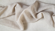 Piece Of Fine Linen On A Gray Background