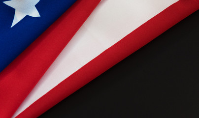 United states of america flag close up in dark background with copy space